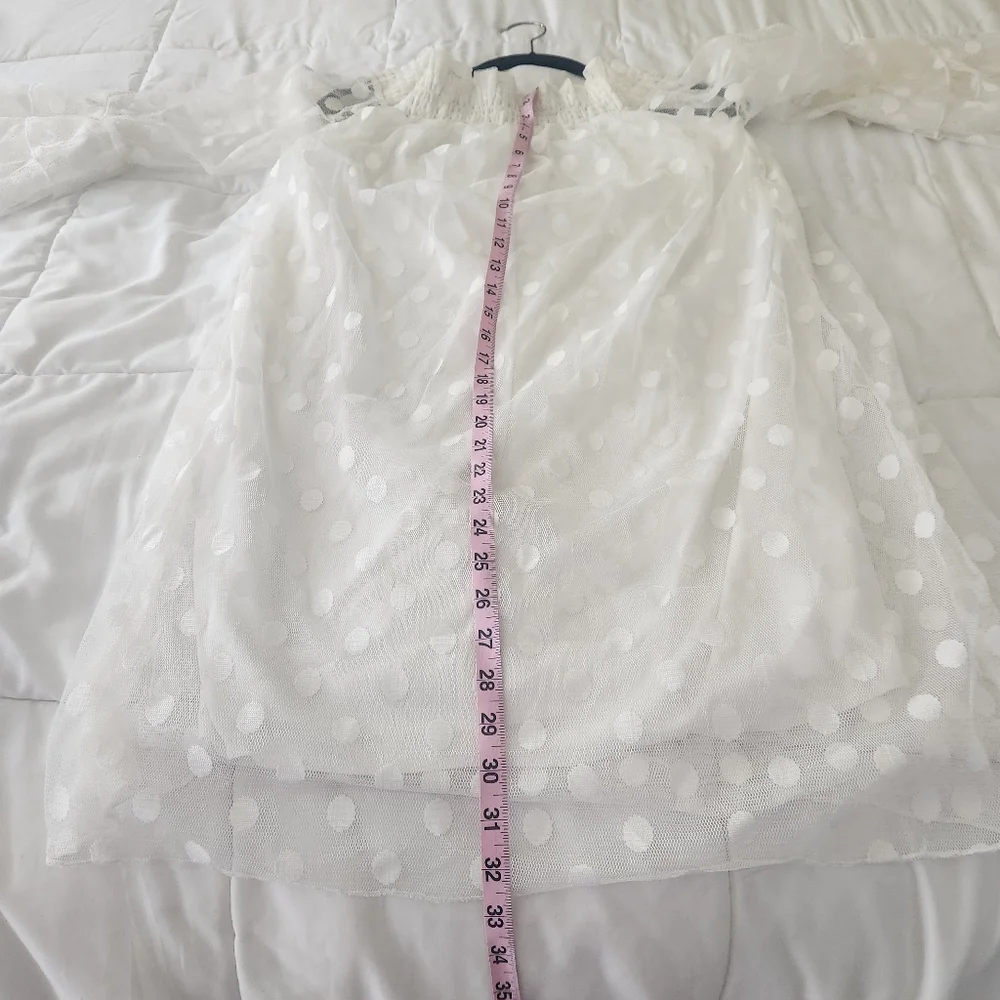 White polka dot bell sleeve dress. Stretchy collar that can be worn off shoulder - Picture 2 of 11
